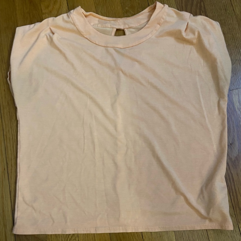 Athleta girl size 8-10/M All Around tee in orange great condition, lightly used